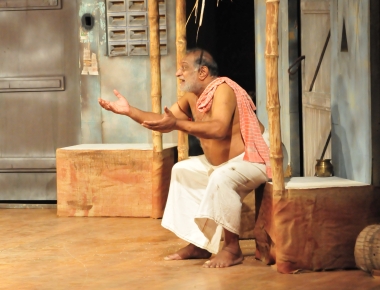 D Ramachandran in the play 'Water' directed by P C Ramakrishnan